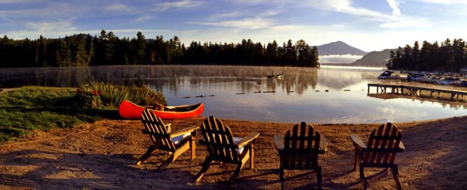 Lake Placid beach and Adirondack chairs.