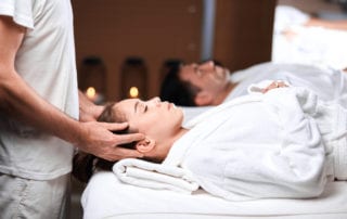 Woman receiving a scalp massage.