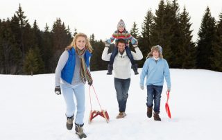 Picture of family at the Lake Placid Toboggan Chute.
