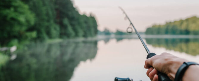 A man fishing in Lake Placid
