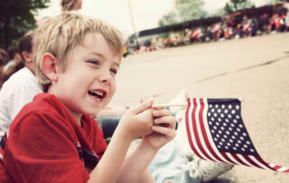 A boy at the Lake Placid 4th of July parade