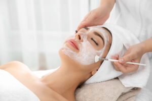 A woman getting a facial at a top New York Spa Resort