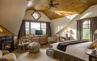 A cozy and rustic suite with a mountain view at a lodge during an Adirondack getaway